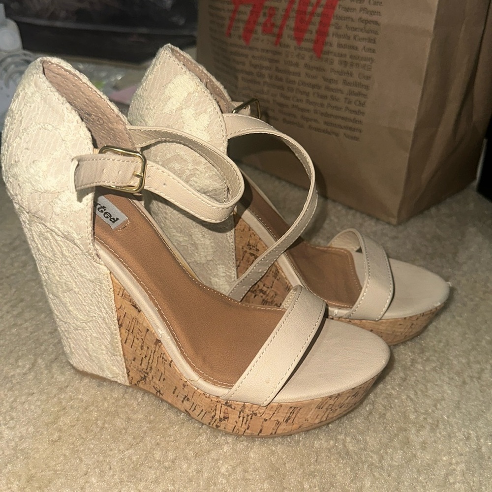 “Not Rated” lace wedge heels